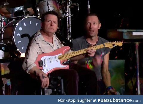 Michael J Fox joins Coldplay on stage at Glastonbury