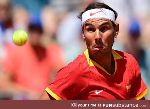 Spain's Rafael Nadal eyes the ball as he returns to Serbia's Novak Djokovic - 2024 Paris