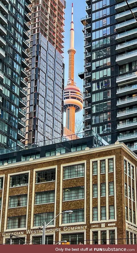 CN tower between two buildings