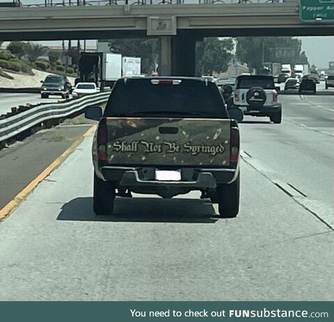 [OC] “Shall not be syringed” decal on the bed of a truck