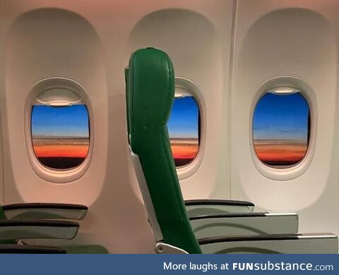 Sunset inside an almost empty plane