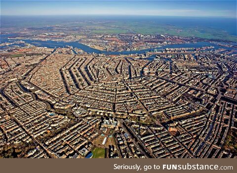 The City of Amsterdam has over 165 canals that connect the city and allow for efficient