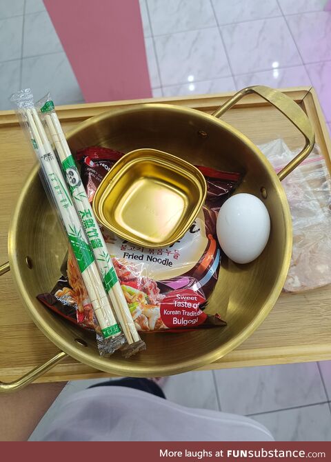 This pack of instant ramen, egg and 2 slices of meat cost me around 9 dollars(450php)