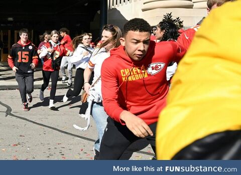 People flee after shots were fired near the Kansas City Chiefs’ parade in Kansas City,