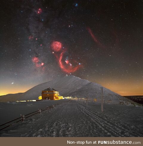 Night sky with Orion rising above Śnieżka, a mountain on the border b/w Poland & the