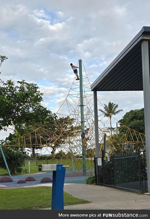 A Dad at the playground living his best