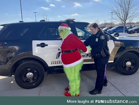 Sioux Falls police department arrests Mr. Grinch for attempting to steal holiday cheer