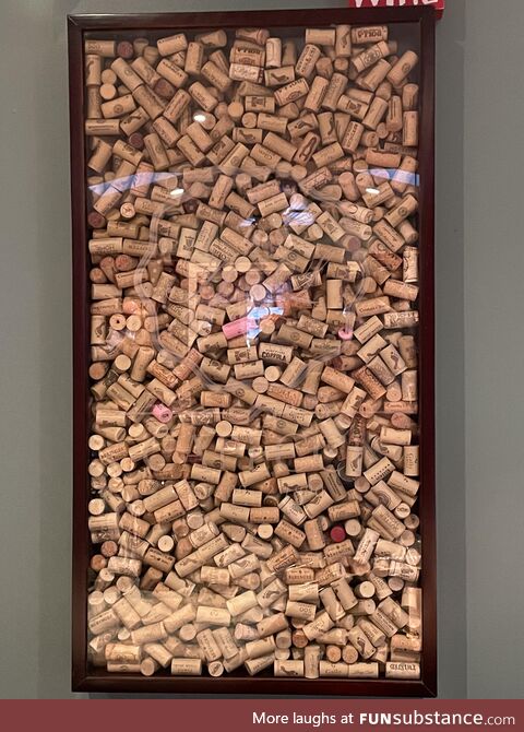 How many wine corks are in this 18”x 36” x 2” cork holder? My family bet money