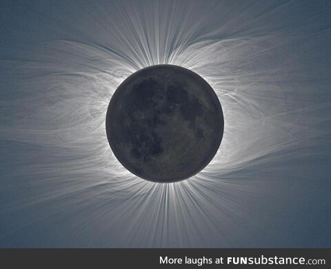 A solar eclipse of immense magnitude -- The wispy lines visible around the moon are