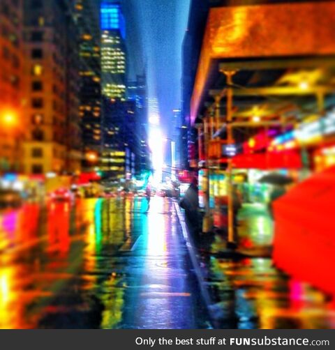 Rainy nights in NYC. Times Square got me in a trance