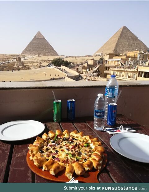 Pyramids of Giza as seen from a nearby Pizza Hut a quarter mile away