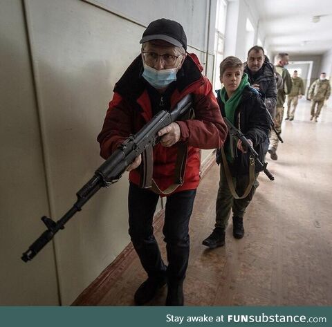 Ukrainian civilians training to defend themselves in the event of an invasion