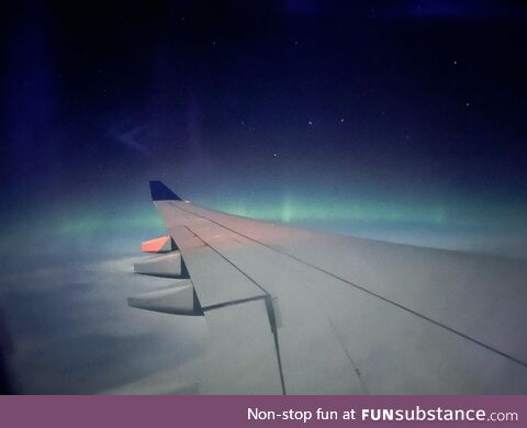 Northern lights illuminated my flight home from Detroit to Amsterdam on 09/03/2023