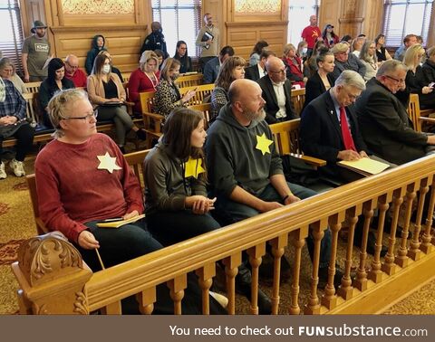 Anti-vaxxers showing up to municipal meetings wearing yellow stars, Kansas