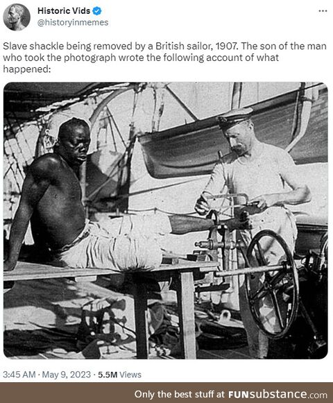 White man freeing a black slave