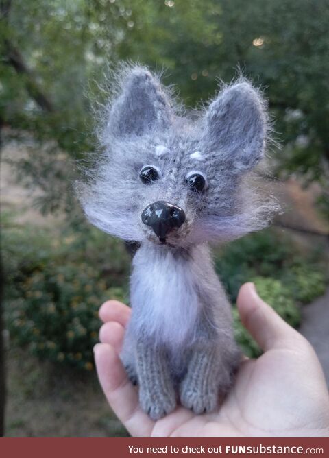 A cute little wolf that I recently knitted and am very happy with the result