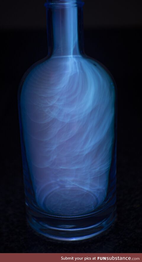 4 second exposure of alcohol vapor burning in a bottle