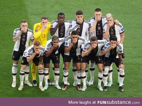 German football team covers their mouths at their first game in Qatar