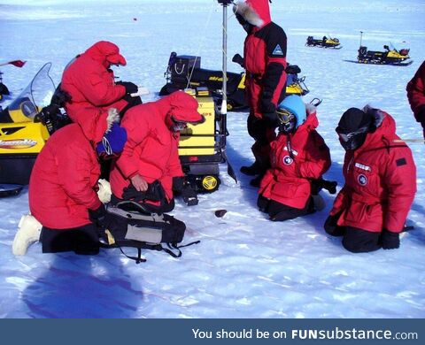 My research team finding a meteorite in Antarctica