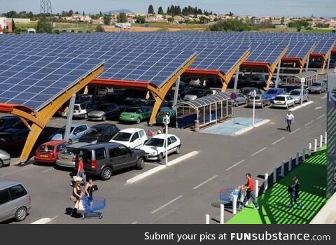Solar panels in parking lots make so much sense. We should do this everywhere in the US
