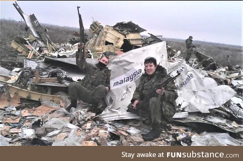 Russian soldiers are photographed near the downed Boeing MH17. It happened exactly 10