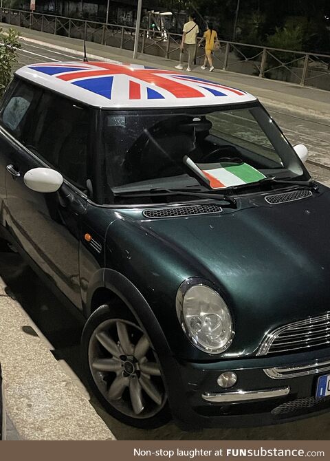 Milan, Italy Euro Finals Mini Cooper with English livery on the hood prints Italian flag