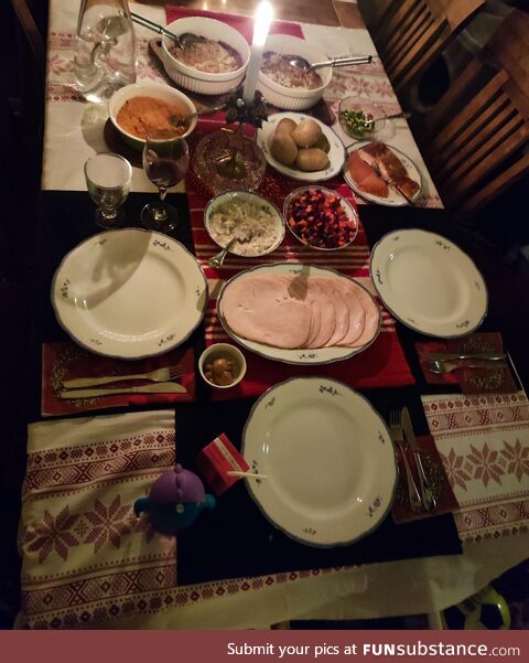 Our first Christmas in our house that we bought last month. Tablecloth is actually a