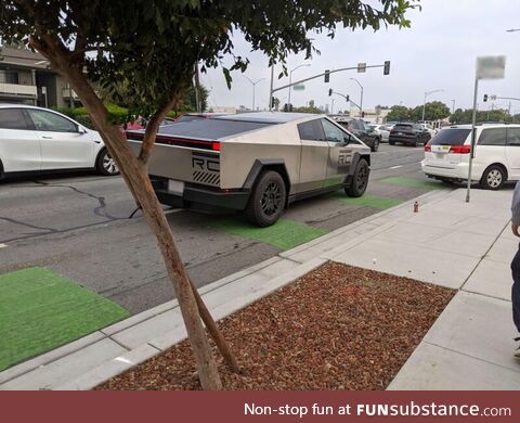 Near a Tesla factory. A driving cybertruck