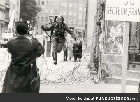 East German soldier escapes by jumping over barbed wire