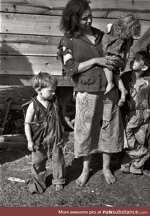 Mother and children living in field near the Tennessee River, March 1936