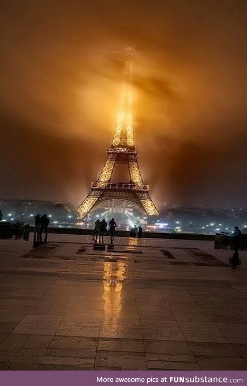 The Eiffel tower through fog