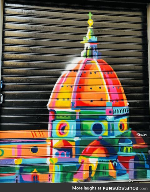 Beautiful graffiti spotted on a closed shop in the streets of Florenze