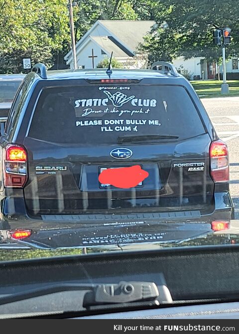 On a road between a church and elementary school