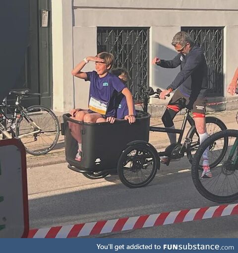 King Frederik X of Denmark arriving on cargo bike to annual running event in Copenhagen