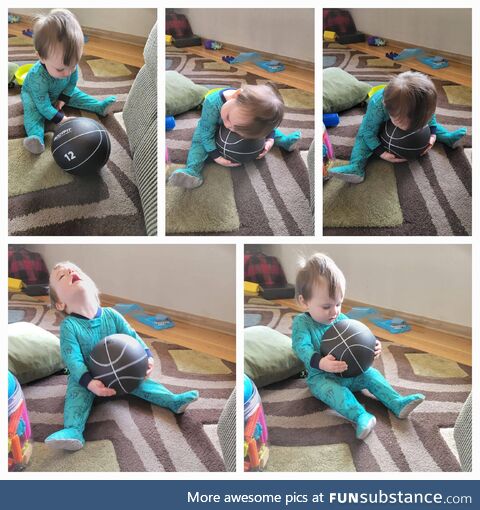 My 1 year old determined to lift the 12lb medicine ball after seeing his older brother do