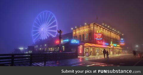 (OC) Seattle ferris wheel on the waterfront during a fog