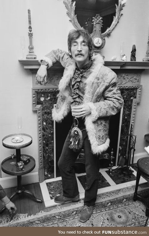 John Lennon sporting an Afghan coat and a sporran (the hairy thing dangling from his