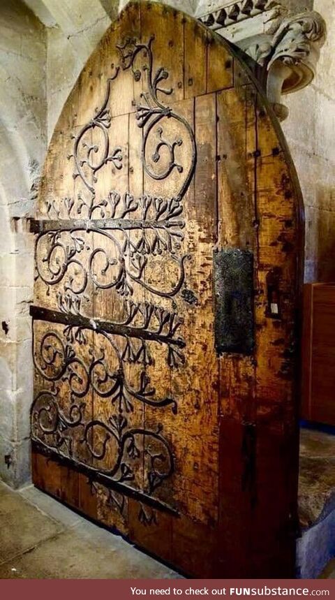 A 12th century door at Wells Cathedral in Somerset, England, UK