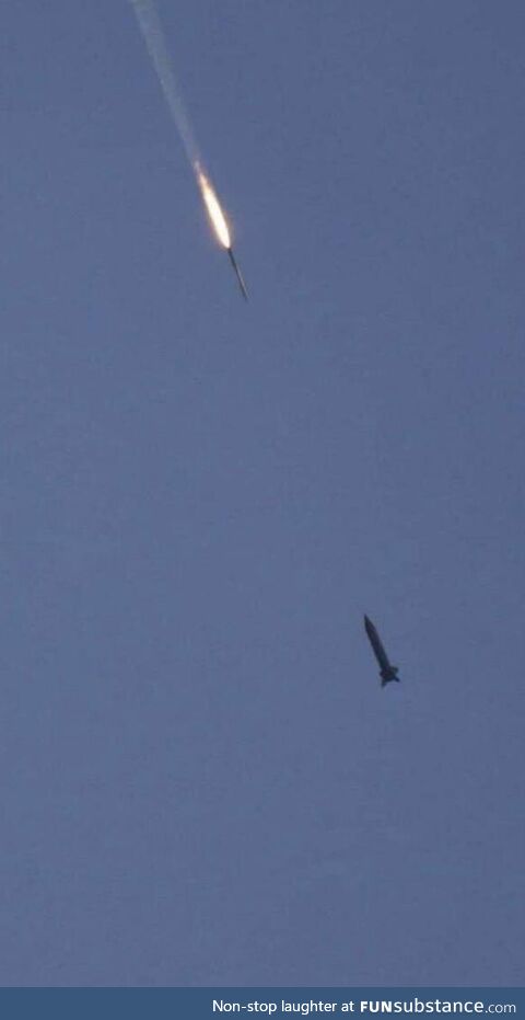 An air defence system’s rocket hundredth of a second from intercepting a missile