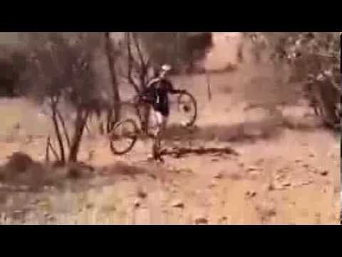 Giraffe stalks mountain bike cylist in South Africa